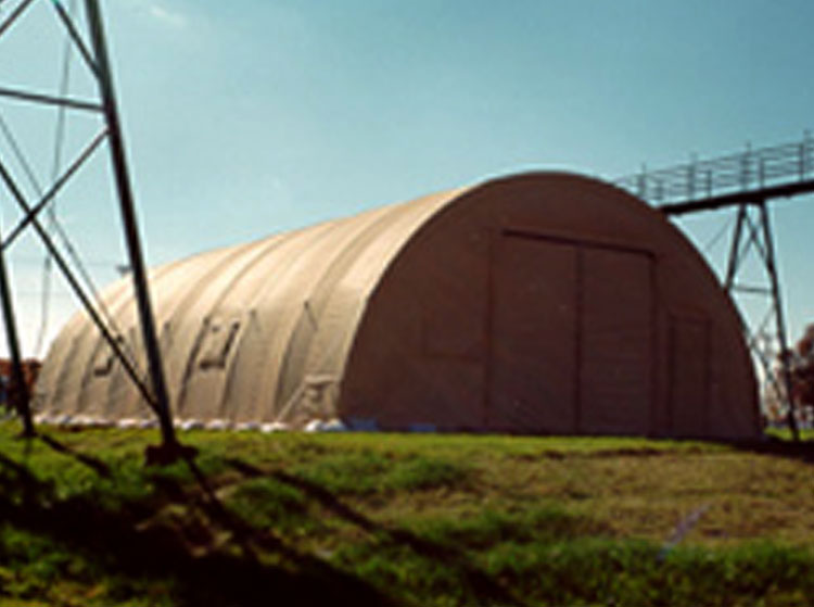 California Medium Shelter System at U.S. Army Aberdeen Proving Grounds during high wind and rain tests.